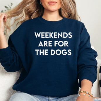 Navy weekends are for the dogs modeled by a woman sitting on a couch.